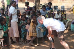 Scott Hayes with village kids